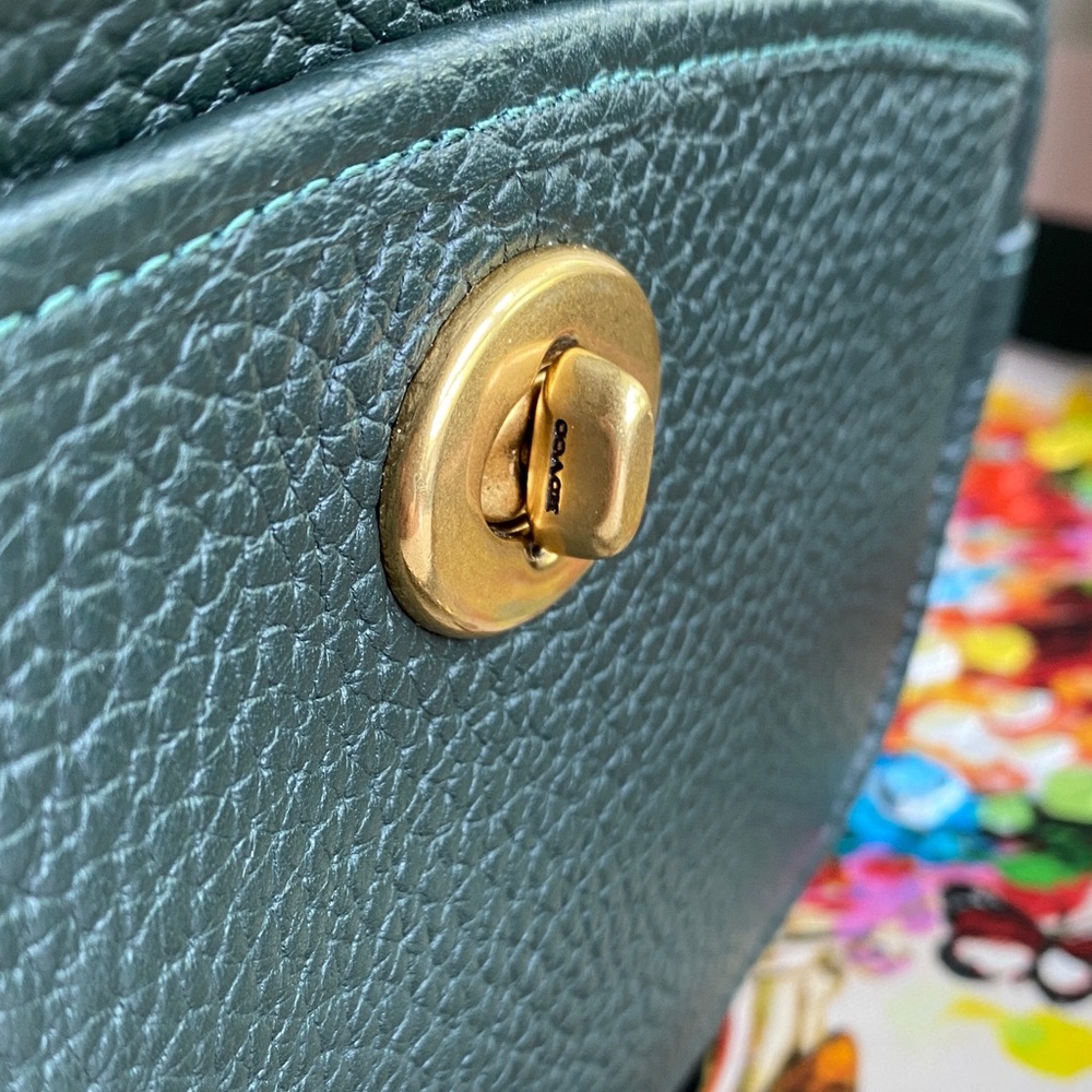 Coach Amazon Green Pebbled Leather Crossbody Bag with Gold Hardware.